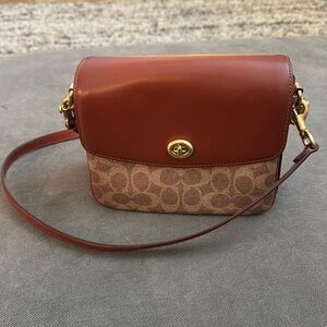 Small coach cross body phone carrier bag